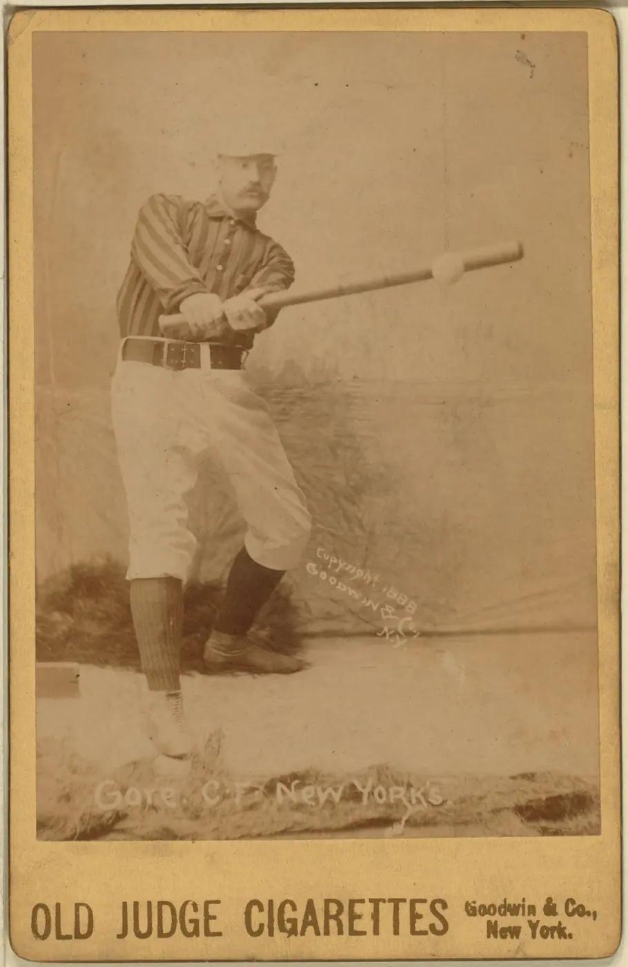 An 1888 Old Judge cabinet card showing a baseball player with his name and team printed beneath