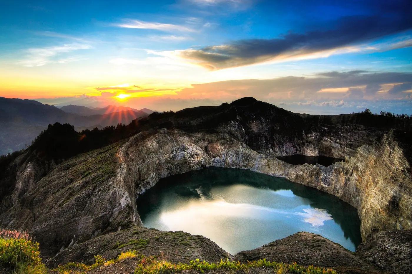 The coloured crater lakes of Kelimutu volcano at dawn, Flores, East Nusa Tenggara