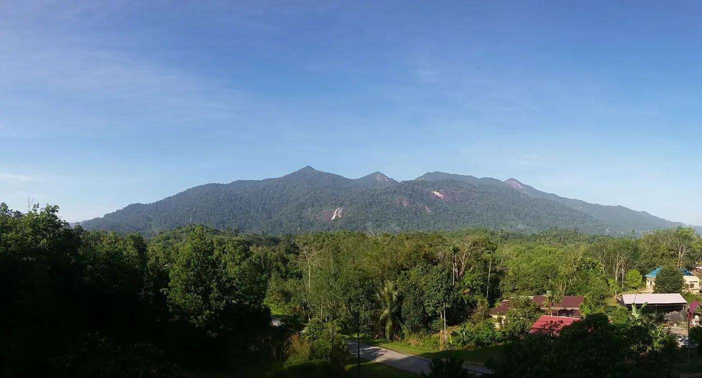 Jelawang waterfall pouring down the forested face of Gunung Stong, Kelantan