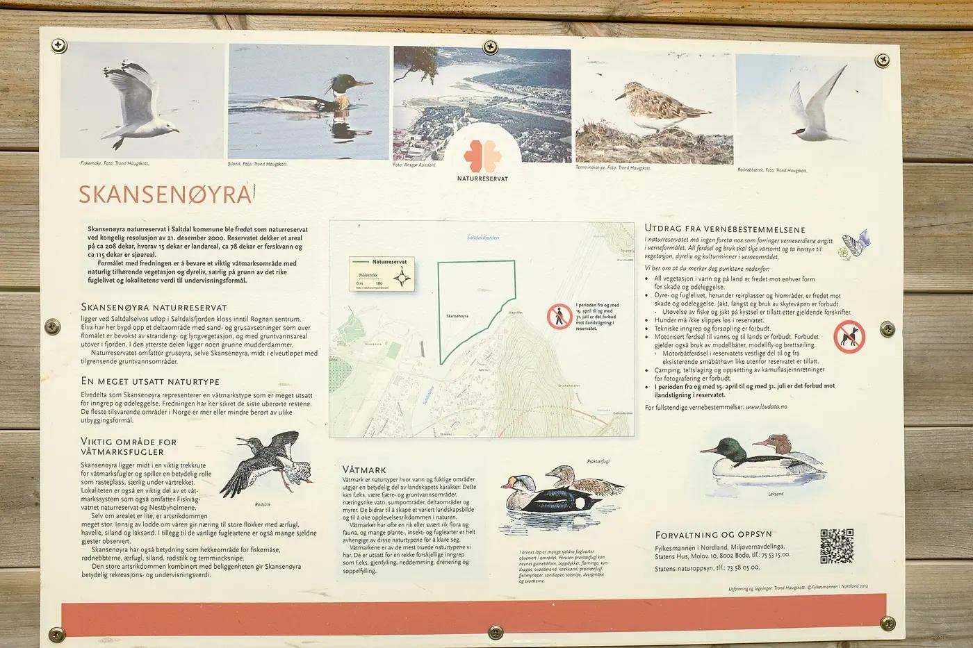 An information board at a Norwegian nature reserve showing photographs and drawings of the wetland birds found there